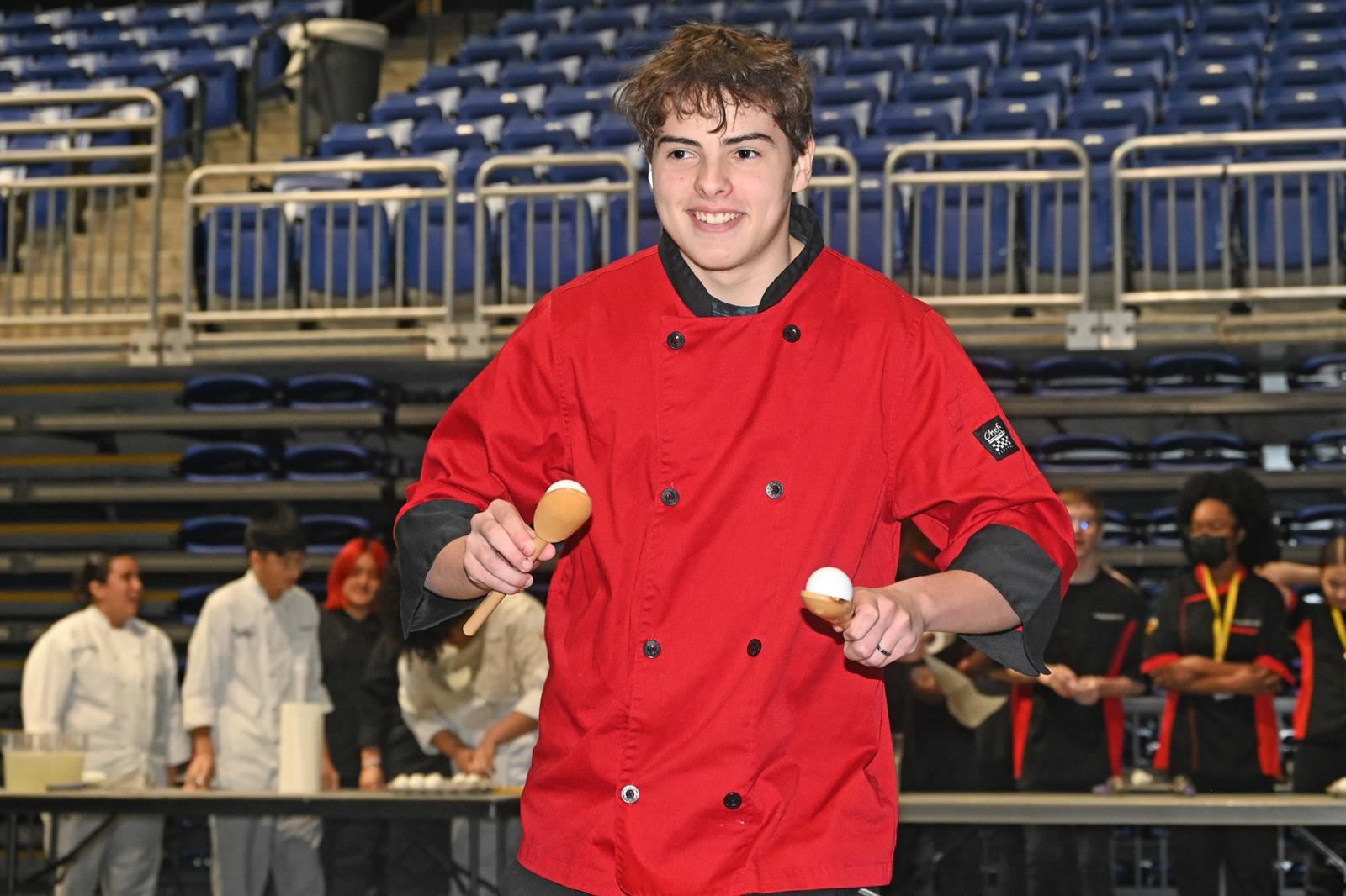 Students participated in a meringue challenge, a relay-style race that featured participants carrying eggs in spoons.